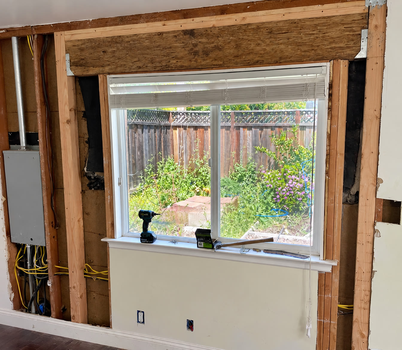 Window installation and surrounding wall preparation