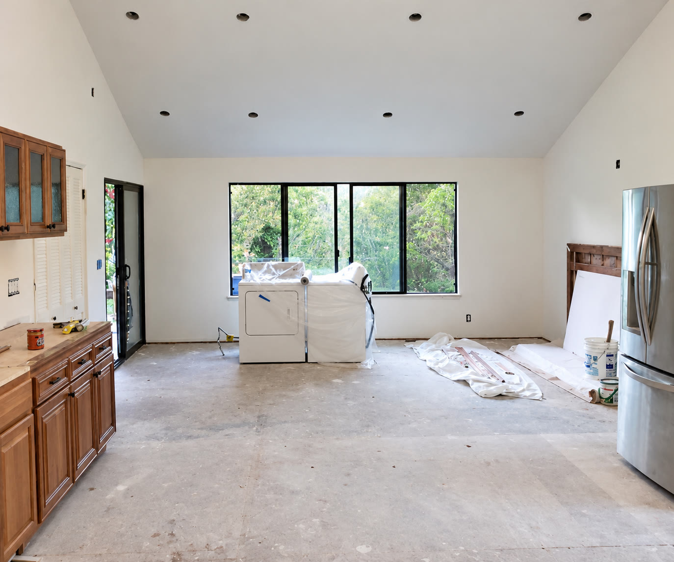 Interior room during renovation with unfinished flooring