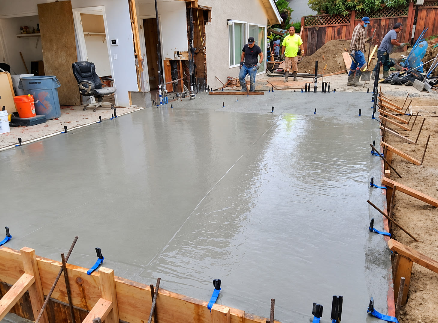 Fresh concrete slab during residential foundation construction